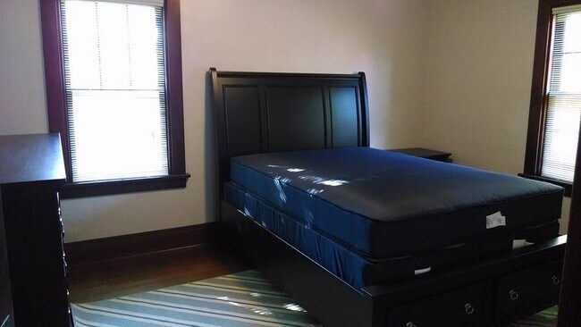 Bedroom includes bed, night stand and dresser - 545 Fulton St