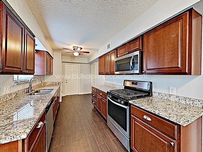 Building Photo - 8476 Sweetwood Dr