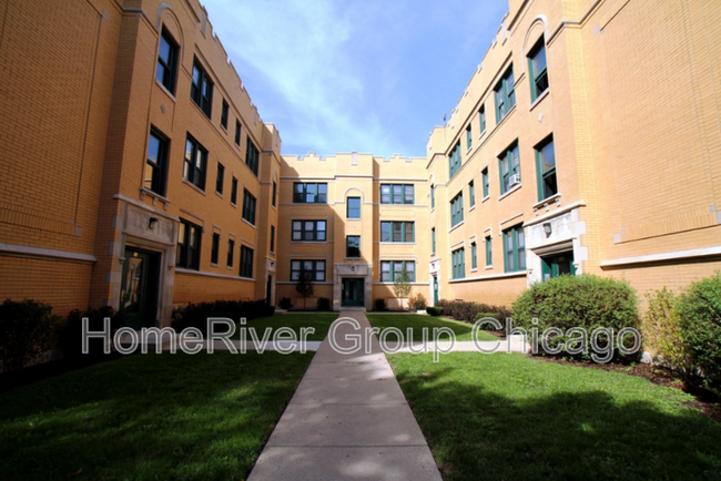 Building Photo - 10928 S Vernon Ave