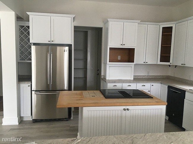 Foto del edificio - 4 br, 3 bath House - 4456 Luke Avenue