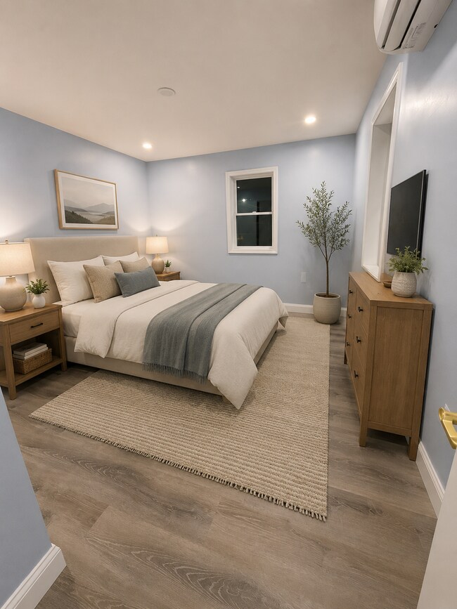 Dormitorio más grande decorado con IA - 88 Fairacres Ave