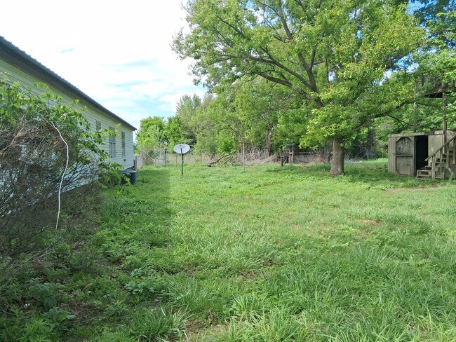 Foto del edificio - Charming 4BR Home in Cave Springs