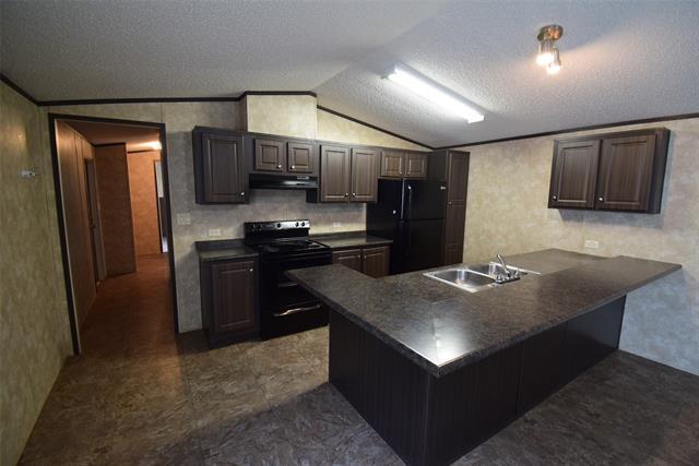 Foto del edificio - 6000 Spring Creek Pkwy
