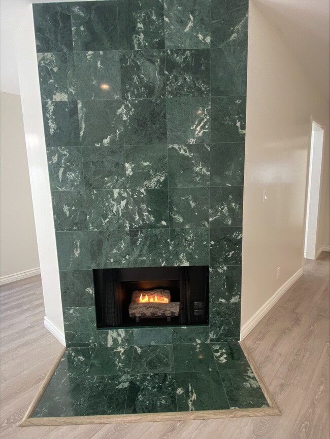 Floor To Ceiling Marble Gas Fireplace - Large Remodeled 2x2 Unit with Huge Patio