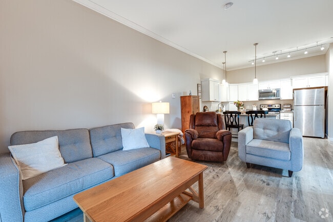 1BR, 1BA - 690SF - Kitchen and Living - Conifer Ridge Apartments