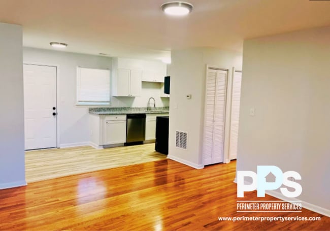 Building Photo - 6127-6129 E Fayetteville Dr