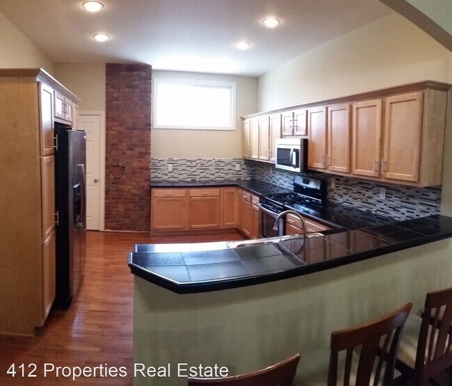 Foto del edificio - 4 br, 2 bath House - 151 Pius Street