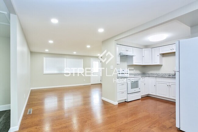 Building Photo - REDUCED! - $1500 off first full month!!