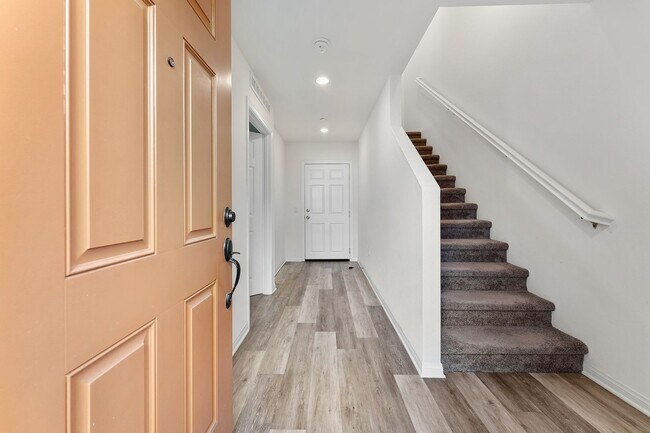 Building Photo - Modern Tri-Level Townhome in Gated Gardena Community with 2-Car Garag