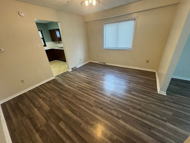 Building Photo - Character-Filled Akron Home with a Flexible Multi-Room Layout