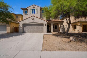 Building Photo - 9442 W Palm Ln