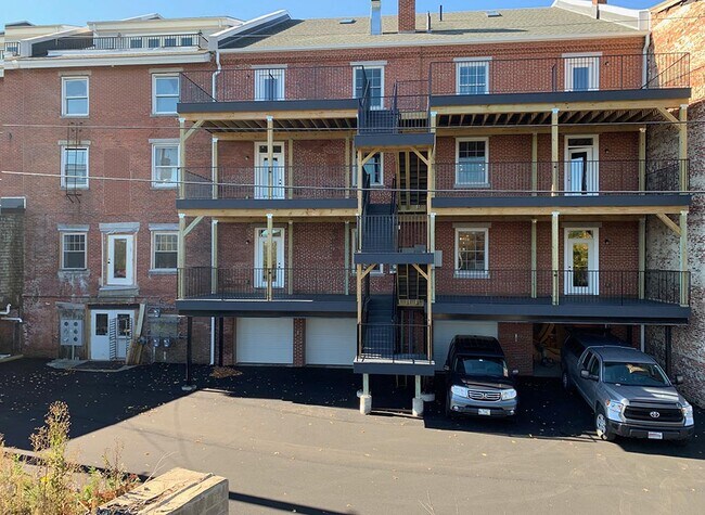 Back of building, garage, storage, back entrance - 165 Water St