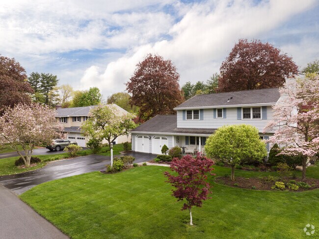 Well-manicured lawns are frequent sight in Delmar.