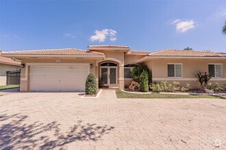 Building Photo - 7821 NW 160th Terrace