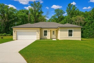 Building Photo - 7738 N Creek Way