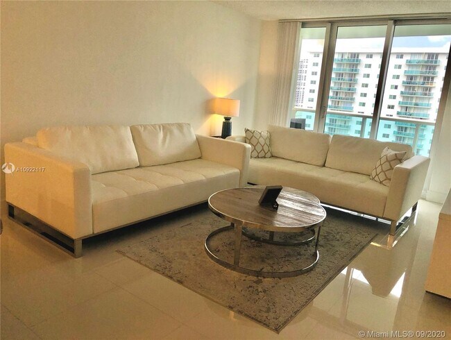 Building Photo - 19370 Collins Ave