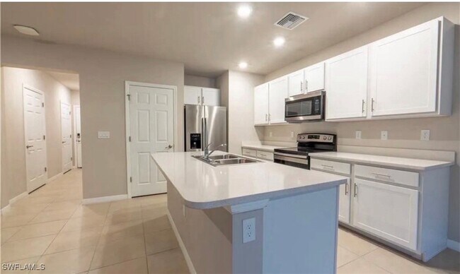 Foto del edificio - 15481 Wildflower Cir