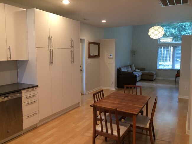 View from kitchen of entry and living space in the background. - 706 Tyler Road