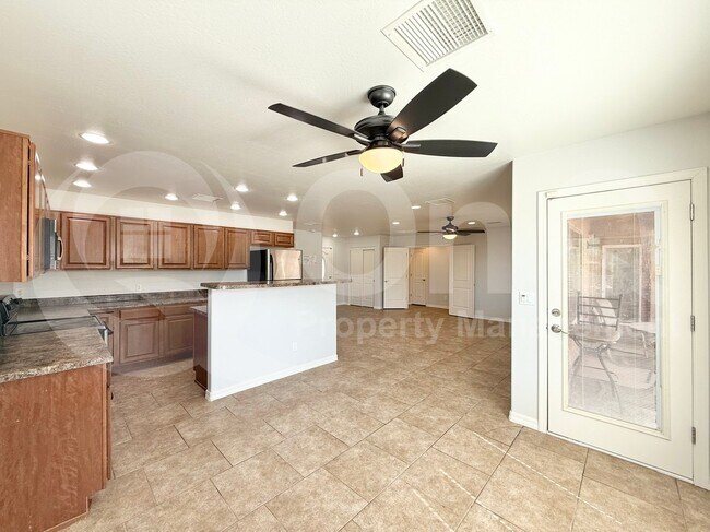 Building Photo - 10545 W Buena Vista Dr