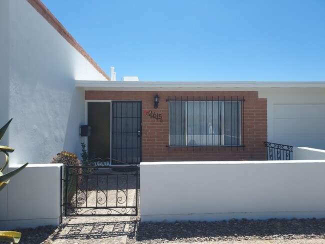 Gated front yard patio and entry to the home - 2615 W Anklam Rd