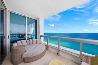 Building Photo - 6899 Collins Ave