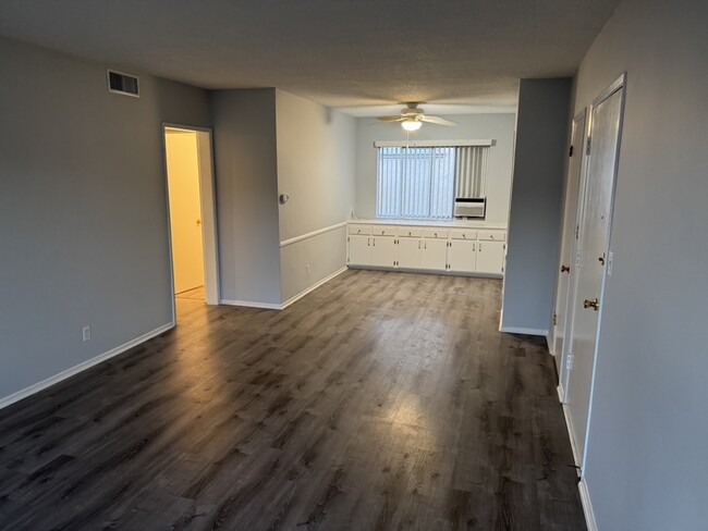 living room with dining room - 2013-2015 S Corning St