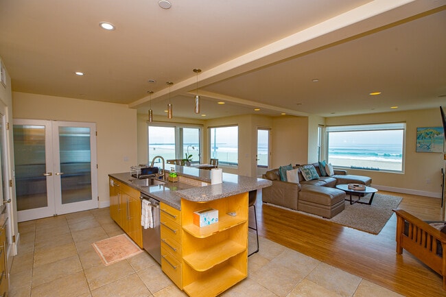 Kitchen island, living, and dining - 2931 Ocean Front Walk