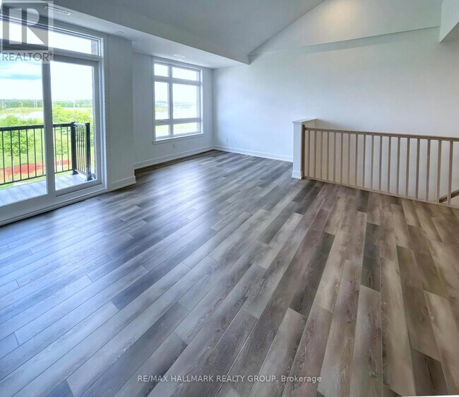 Photo du bâtiment - 300 Tulum Cres