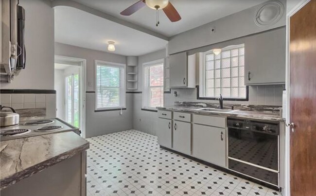 Kitchen with new appliances and breakfast nook. - 5803 Lansdowne Avenue