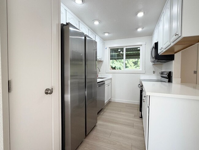 Foto del edificio - Fully updated 4 bedroom Federal Way home