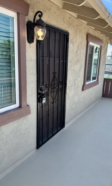Gate to Front Door - 16181 Ganges Lane #4