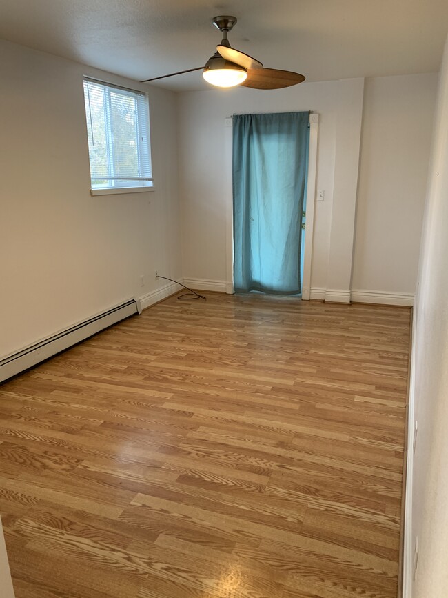 Living room leading to porch - 1039 Grand Ave