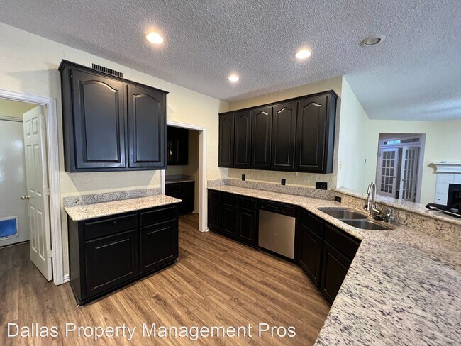 Building Photo - 4 br, 2.5 bath House - 3816 Spanish Oak