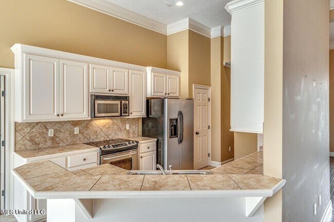 Foto del edificio - 401 Ash Tree Ln