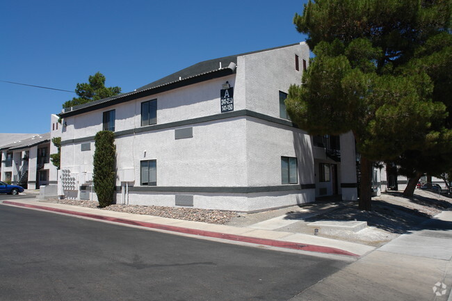 Building Photo - The Maverick and Hidden Village Apartments