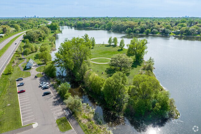 The park offers ample parking and access to Keller Island on Keller Lake in Maplewood