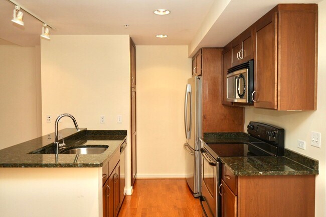 Building Photo - Two Bedroom Condo Available at the Barring...