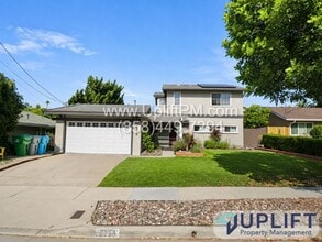 Building Photo - 6234 Rose Lake Ave