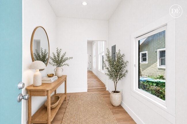 Virtually staged. Furniture, artwork, plants, and décor were digitally added for visualization. Apar - 3412 W 27th St