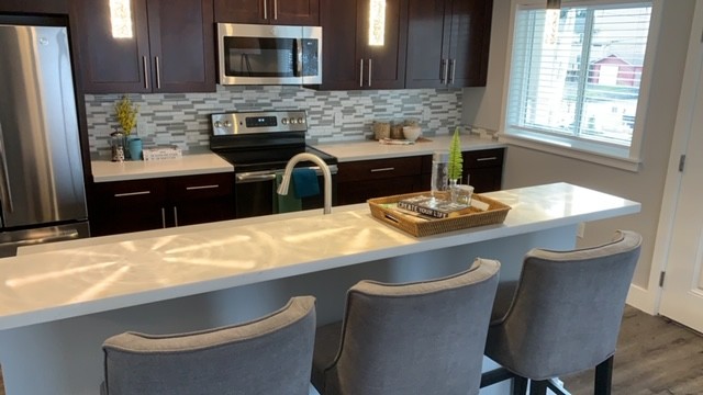 Kitchen and Bar - Highridge Apartment Homes