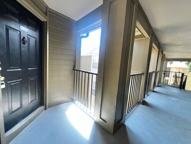 Building Photo - NEW-Remodeled bathroom & kitchen! NEW VINYL PLANK flooring & fresh paint! 2 bedroom 1 bath condo ...