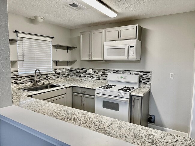 Building Photo - 12235 W Village Dr