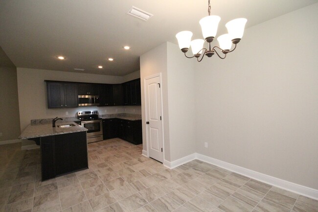 Building Photo - Brick home, 3 bed 2 bath ~ covered porch a...