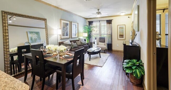 Building Photo - Spacious Living with Urban Convenience!