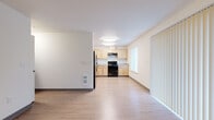 Located at 4710 Plomondon St in Vancouver, WA, this single-floor, 3-bedroom, 2-bathroom home offers a functional and well-organized layout. The open living and dining area is finished with light hardwood-style flooring and features a sliding glass door with vertical blinds, allowing natural light to fill the space.

The kitchen flows seamlessly from the living area and is equipped with light maple cabinetry, black appliances including an electric range and refrigerator, light countertops, and a window that brings in additional natural light. Overhead flush-mount lighting brightens the workspace throughout.

The three bedrooms are carpeted for comfort and each include closets with sliding doors. The primary bedroom is a comfortable size and features a window with blinds, a baseboard heater, and direct access to one of the two bathrooms. The bathrooms feature light maple vanity cabinetry, white countertops, large mirrors, and hardwood-style flooring. One bathroom includes a full tub-shower combination with clean white surround.

A hallway connects the main living spaces to the bedrooms and bathrooms, providing a clear and efficient flow throughout the home. The overall aesthetic is clean, neutral, and move-in ready.