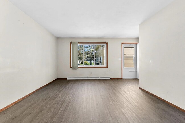 Living room with main entrance - 2416 E Newberry St