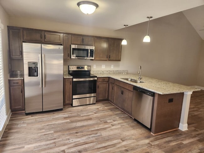 Building Photo - Beautiful 4 Bedroom with Bonus Room Home A...