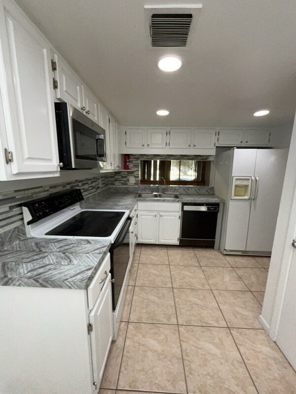 Foto del edificio - 5409 Pine Creek Dr