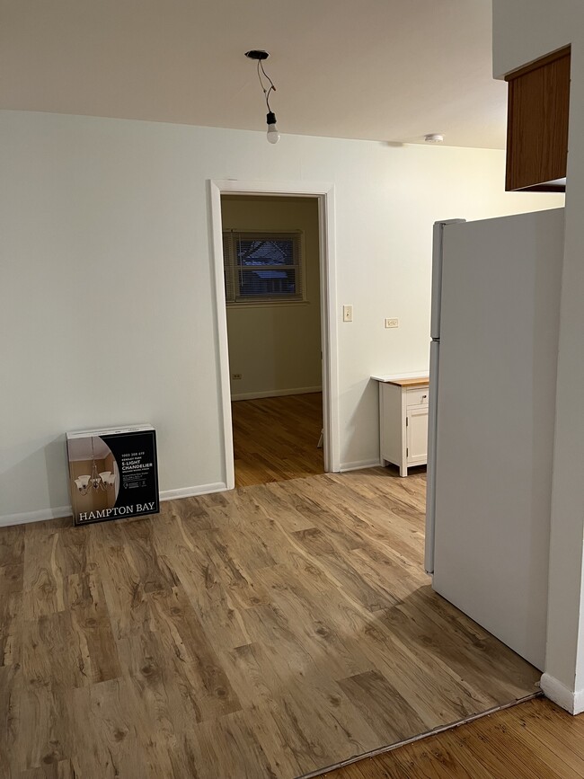 Dining area new paint & floor 2025 - 505 Ryan Ln