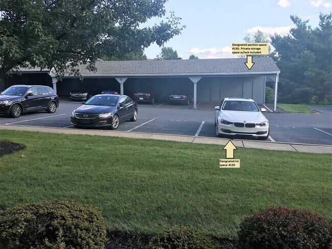 Two designated parking spaces: Lot and Pavilion w/ storage shed; Visible from condo windows - 5123 Cheryl Dr